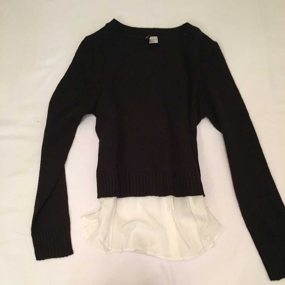 Black sweater with white button up top attached